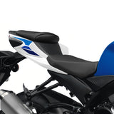 Sport motorcycle seat with blue, white, and black color scheme on a modern bike